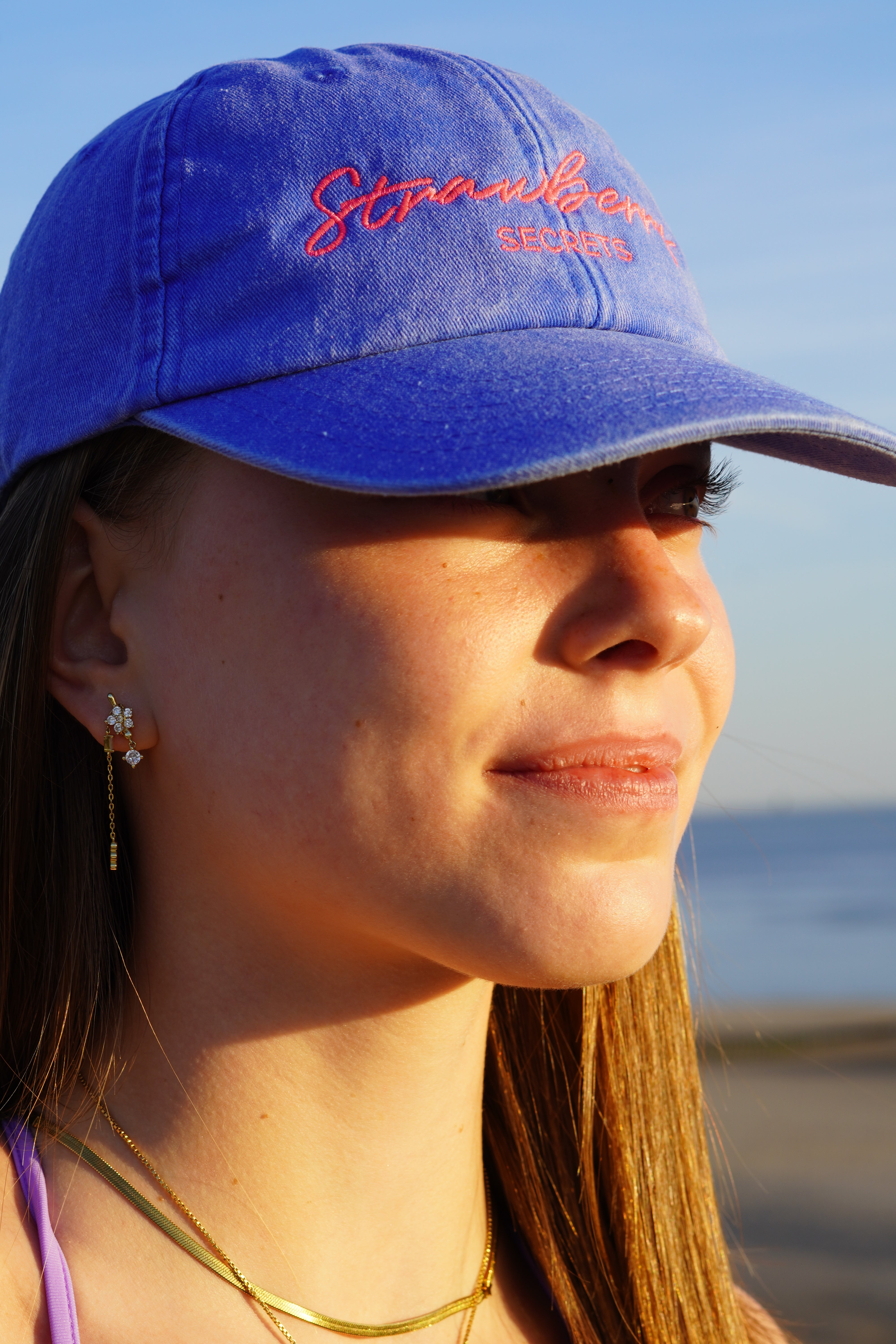 Casquette Rapha en bleu et rose